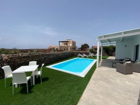 2 bedrooms villa with sea view private pool and furnished terrace at El Roque El Cotillo 1 km away from the beach